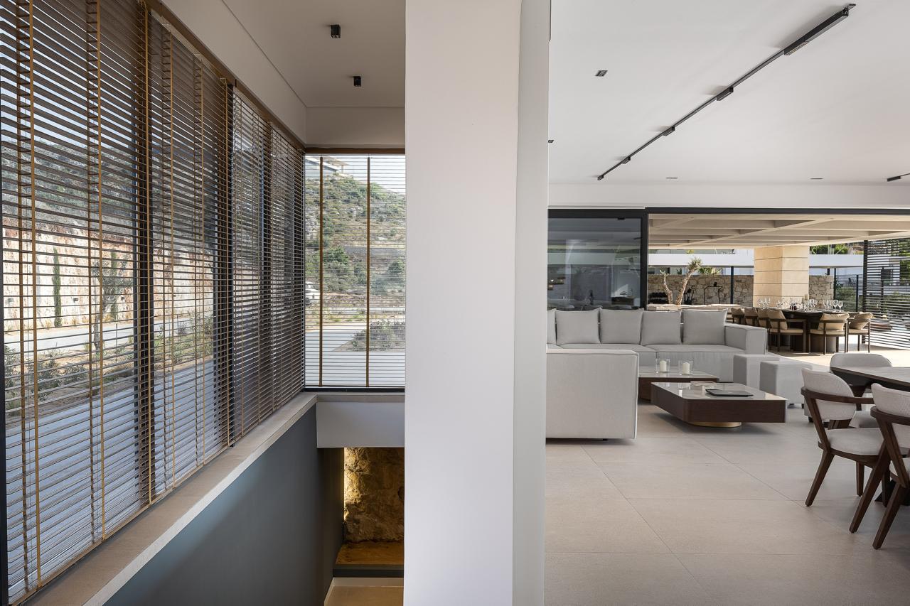 Timber-shaded gallery linking the living spaces
