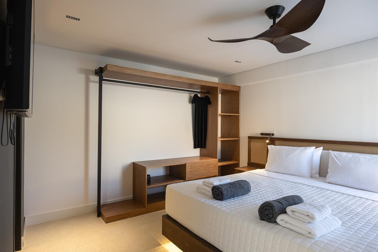 The cane suite with ceiling fan and open oak wardrobe