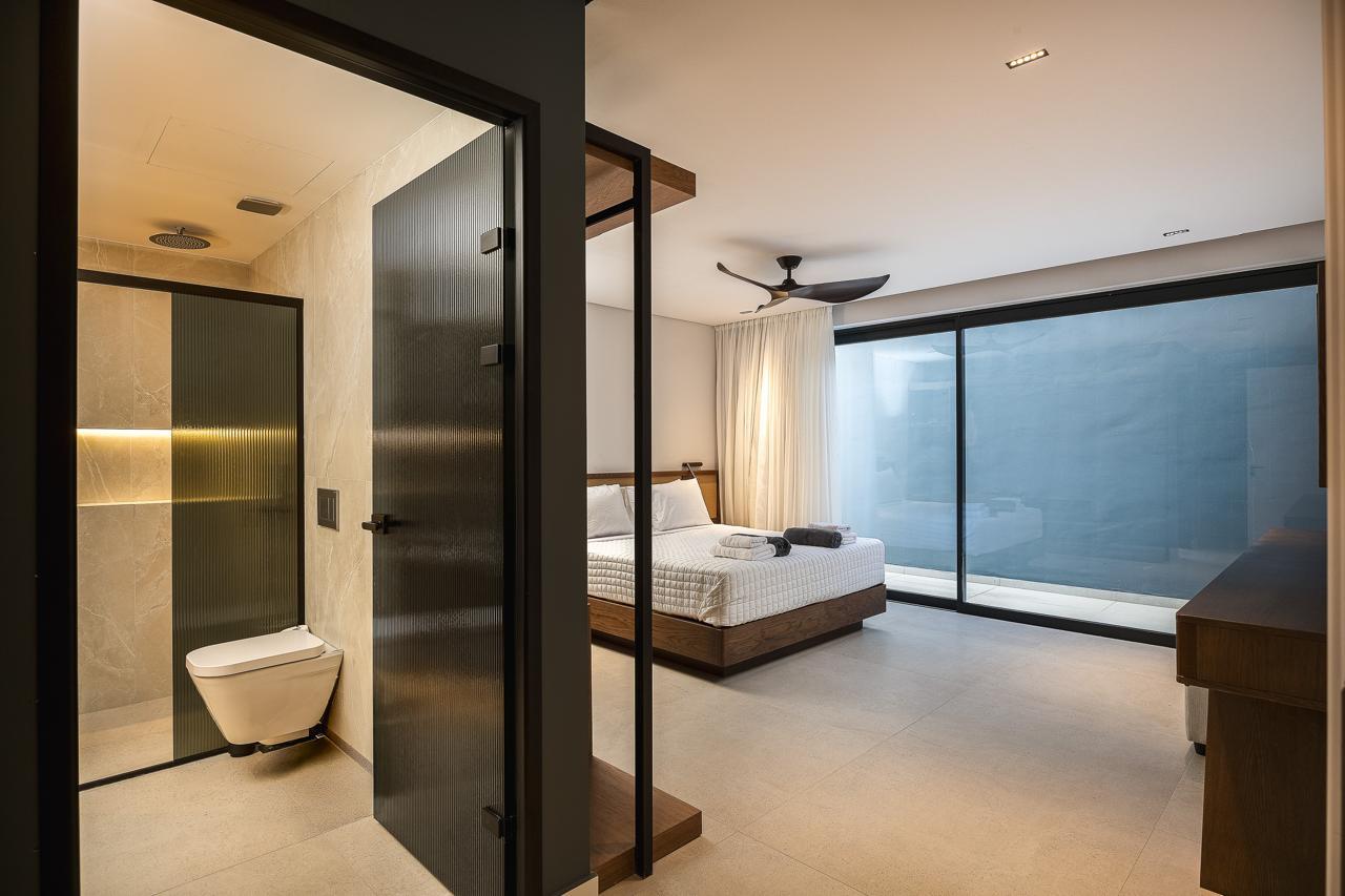 The ensuite looking back through to the bed
